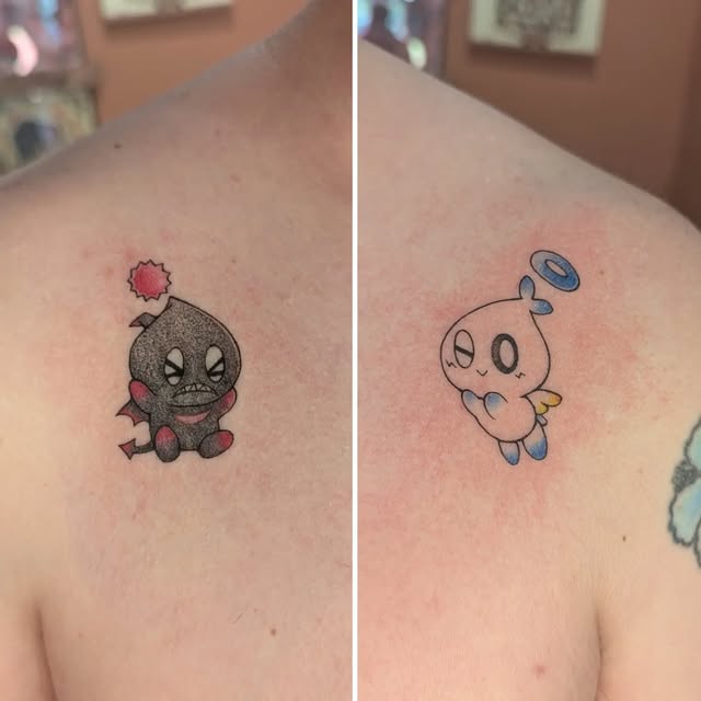 Paired small color character tattoos, one with devil details and one with angel details